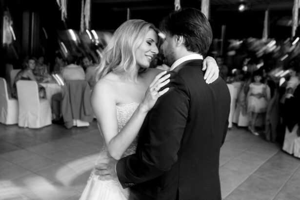 The couple shares a heartfelt moment, capturing the emotion and love in their dance.