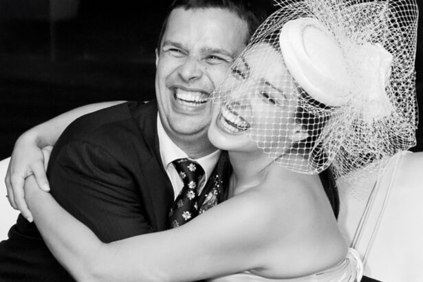 The couple, enveloped in infectious smiles, sharing a moment of pure joy and happiness