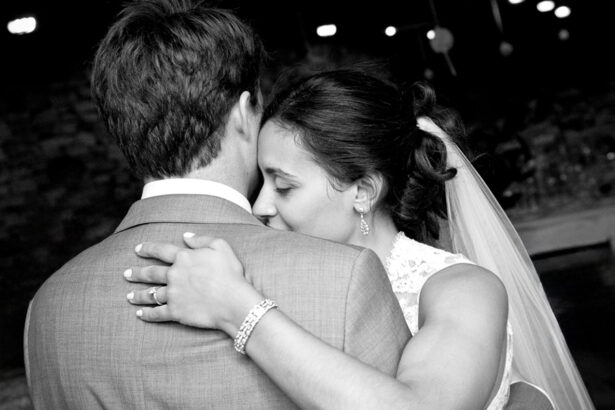 The couple shares a heartfelt moment on the dance floor, capturing the emotion of their special day