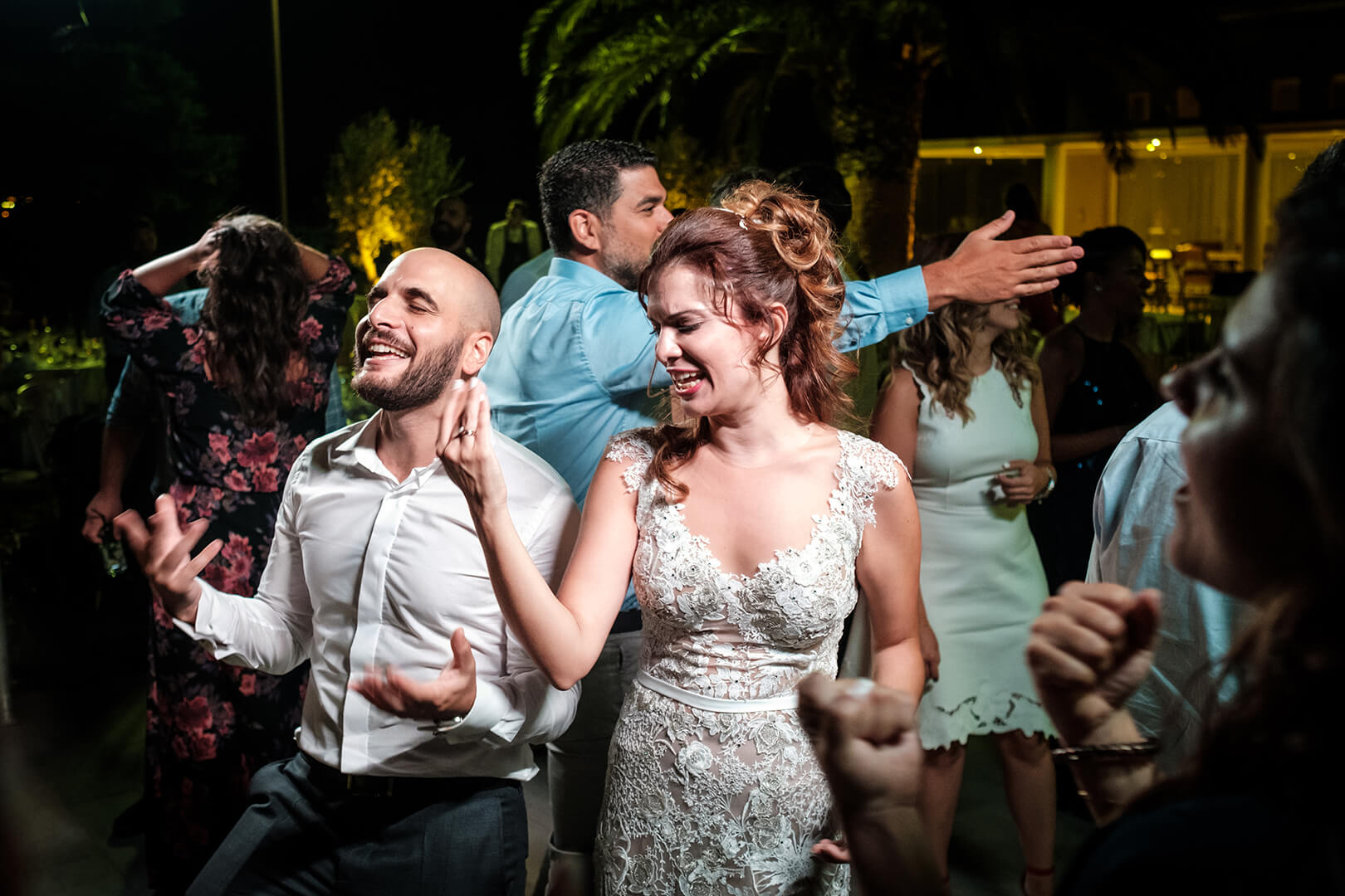Bride rocks the dance floor at her wedding party in Athens