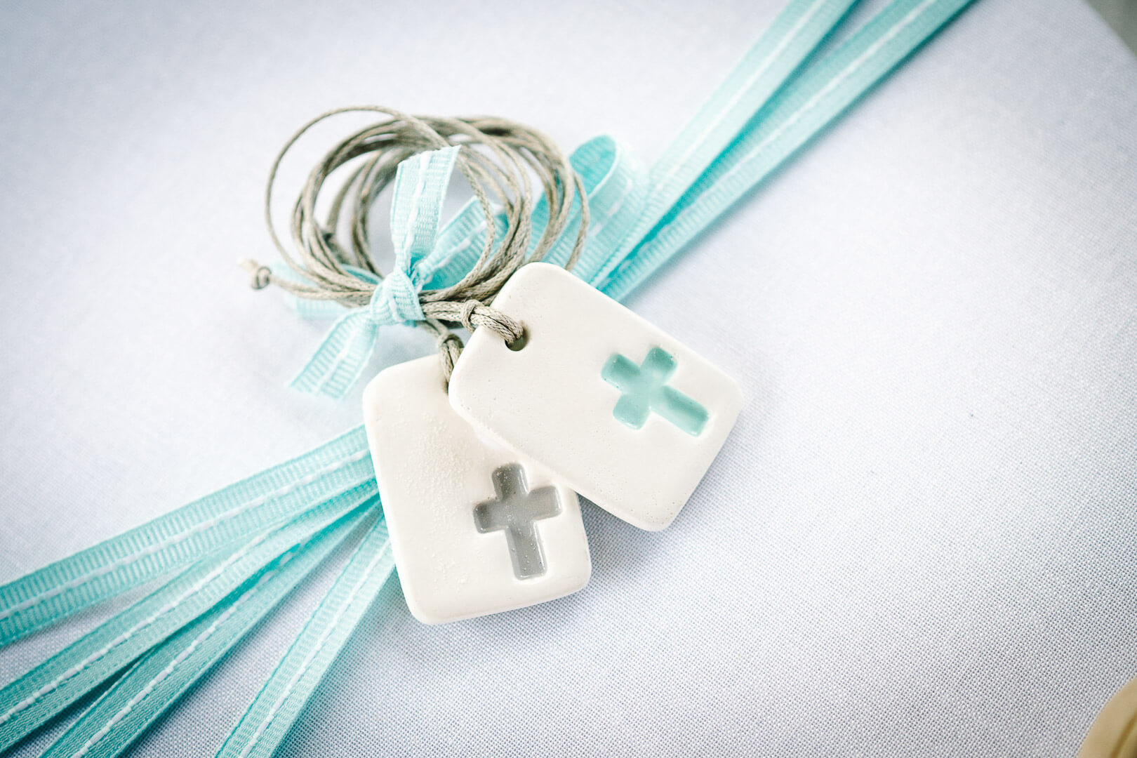 Faithful keepsake: Blue bracelets with crosses commemorate a special occasion.